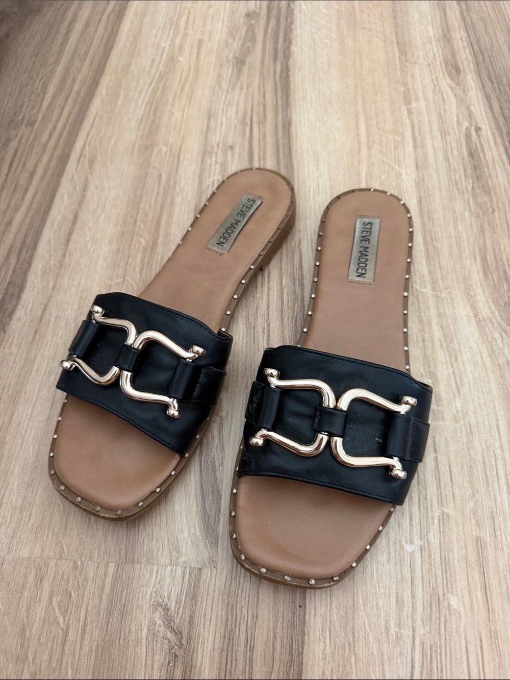 Steve Madden Black Slide Sandals with Gold Buckle Detail
